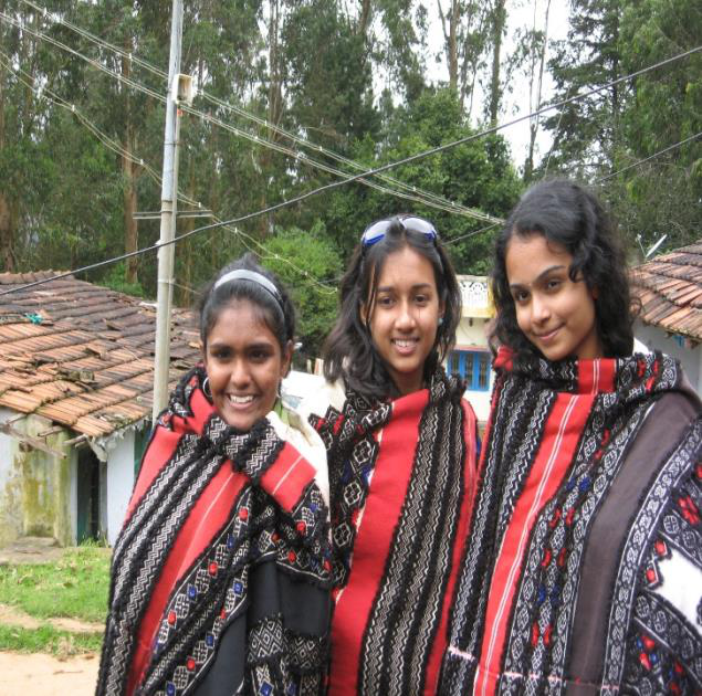 Raffles Girls' School participants in Toda costume at the Toda settlement, Ooty